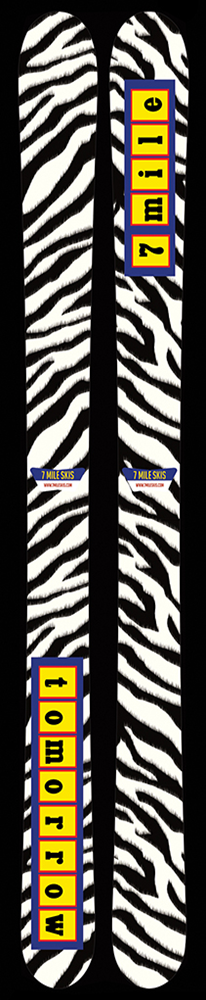 A pair of zebra-striped skis with 7 mile written on one and tomorrow written on the other