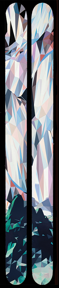 A pair of skis that display a geometric mountain