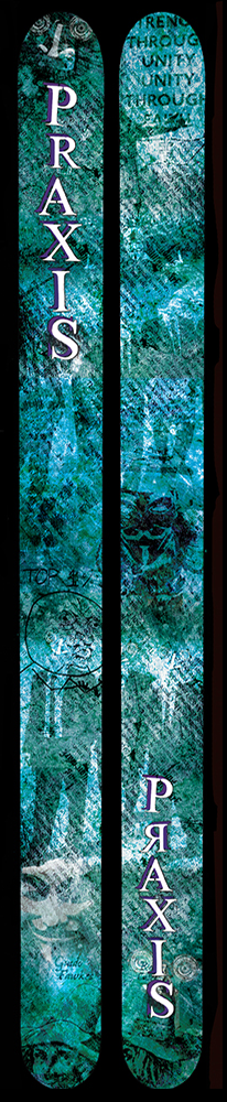 A pair of skis with an abstract blue and green design on them